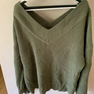Olive green, wide neck sweater.